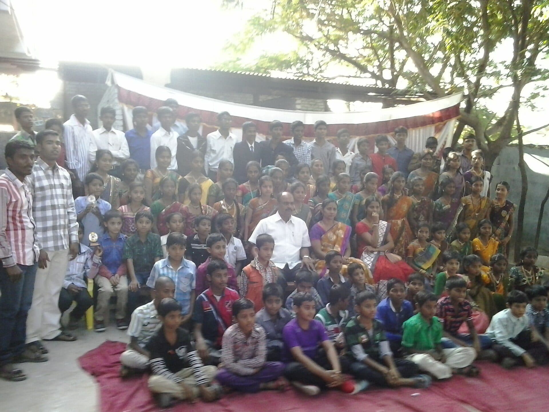 Children and teachers gathered for a Children's Day group photo