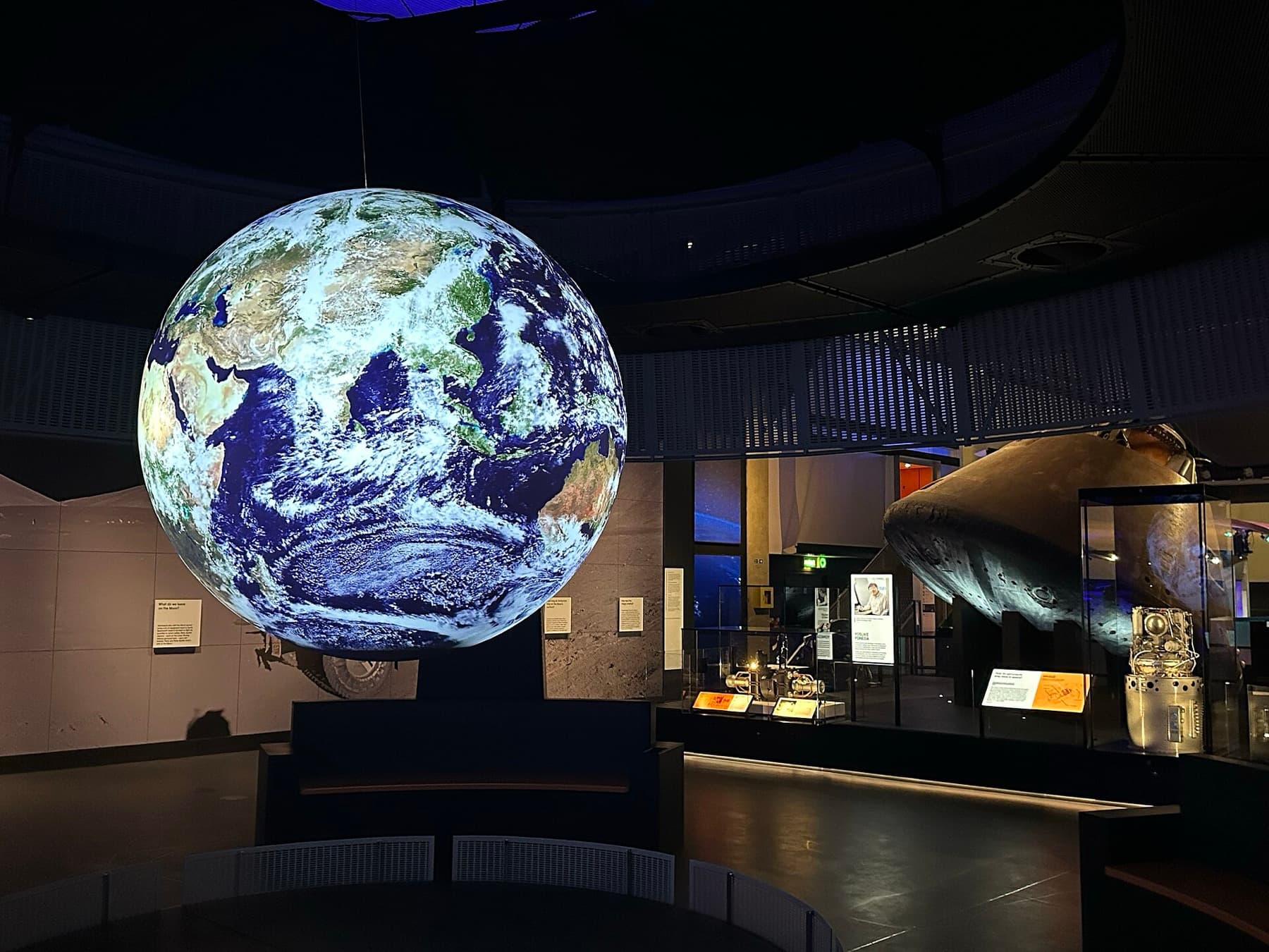 A glowing globe of the Earth in the space gallery of the Science Museum